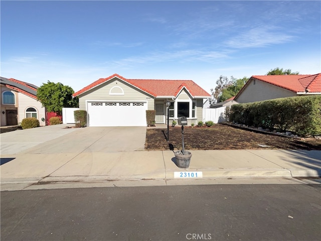 single story home featuring a garage