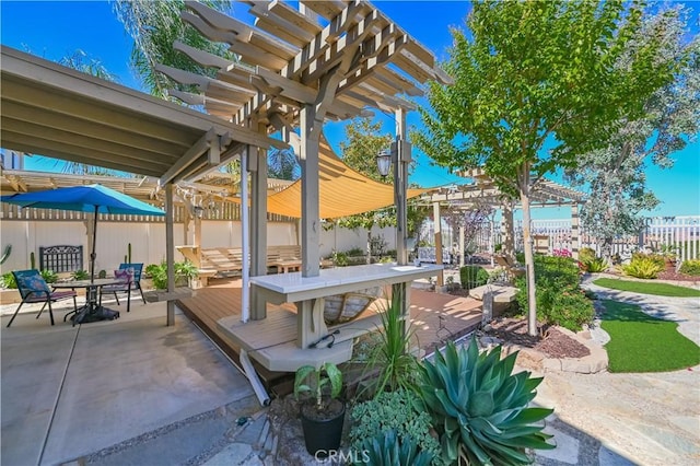 view of patio featuring a pergola