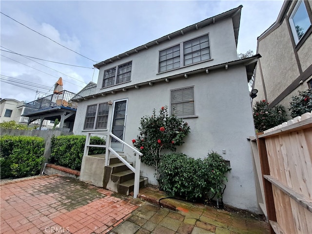 back of property with a patio area