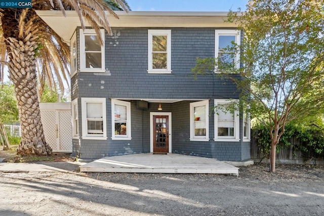 view of front of home with a deck