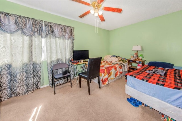 bedroom featuring carpet flooring and a ceiling fan