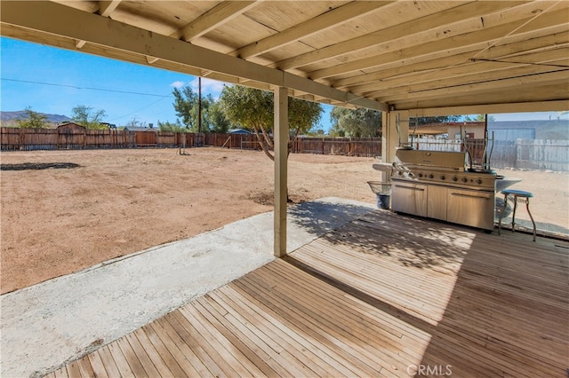 deck featuring area for grilling