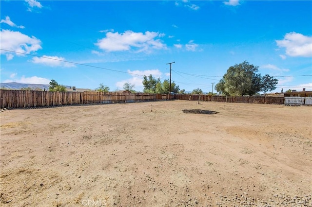 view of yard with fence