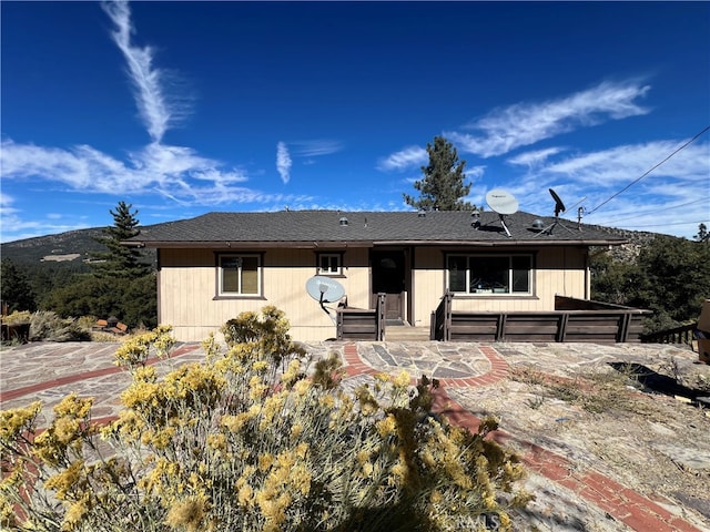 rear view of house with a patio