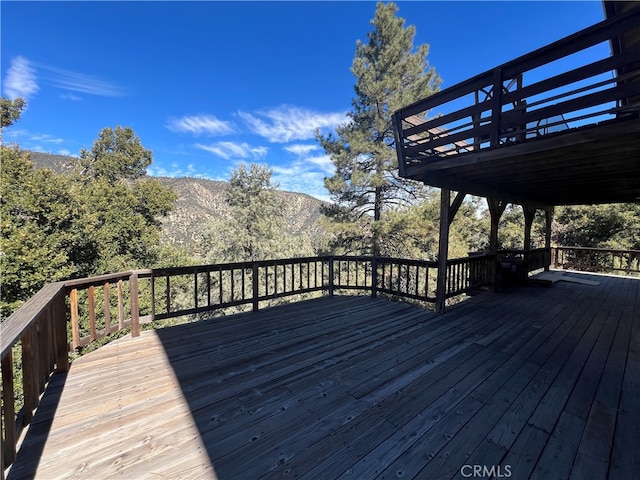 deck with a mountain view