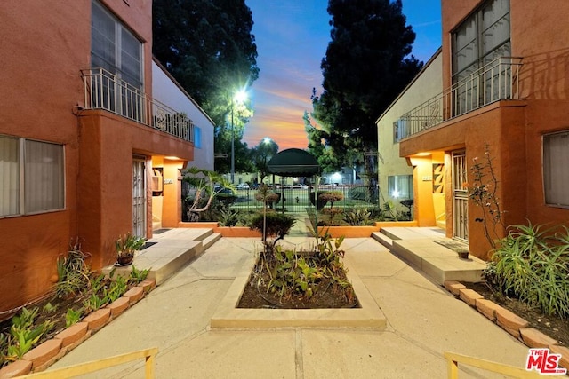 view of community with a patio