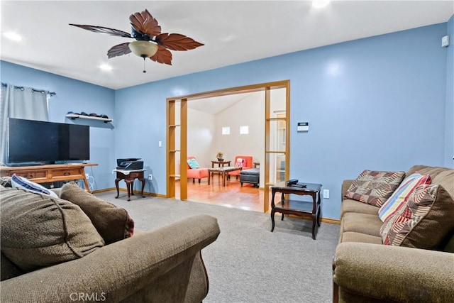 living room with ceiling fan, carpet floors, and french doors