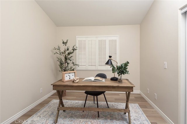 office featuring hardwood / wood-style floors