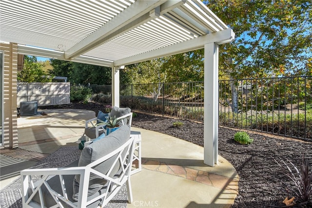 view of patio with central AC unit and a pergola