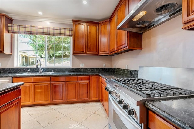 kitchen featuring high end stainless steel range oven, sink, range hood, dark stone countertops, and light tile patterned flooring