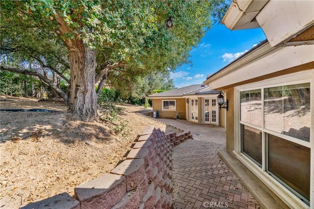 view of yard with a patio area