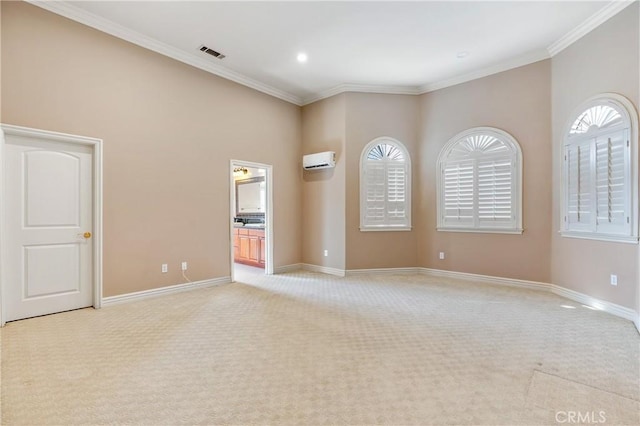 carpeted empty room featuring a wall mounted air conditioner and crown molding