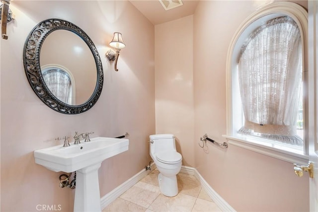 bathroom featuring toilet