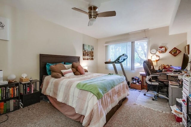 bedroom featuring light colored carpet and ceiling fan