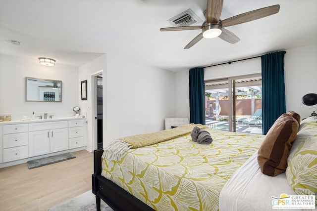 bedroom with sink, access to outside, ceiling fan, light hardwood / wood-style floors, and ensuite bath