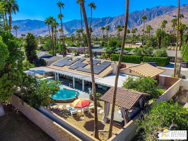 view of pool featuring a gazebo and a mountain view