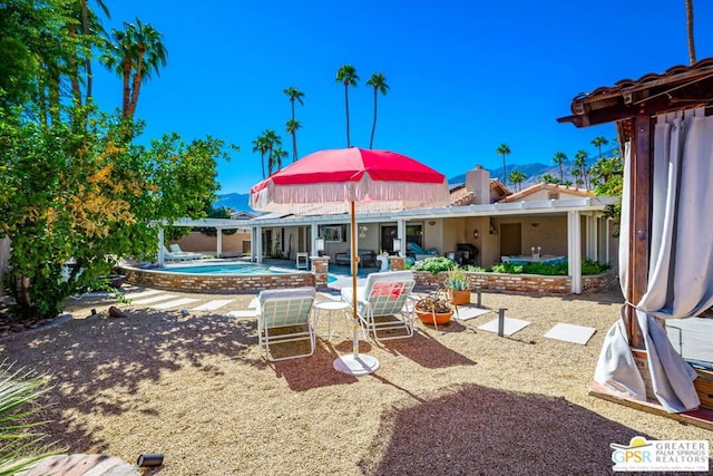 view of patio featuring a swimming pool