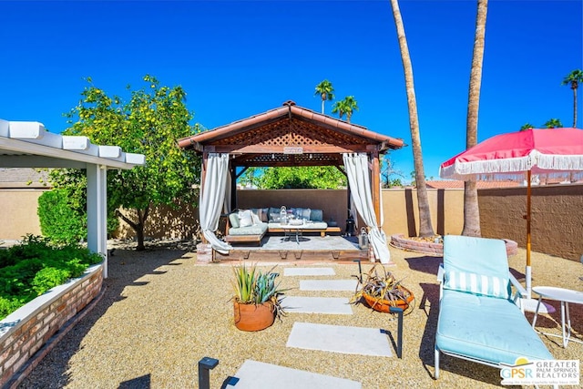 view of patio / terrace featuring a gazebo and outdoor lounge area