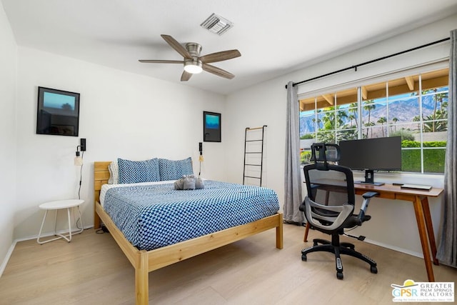 bedroom featuring ceiling fan and light hardwood / wood-style flooring