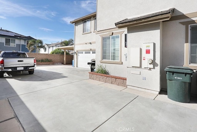 view of property exterior with a garage