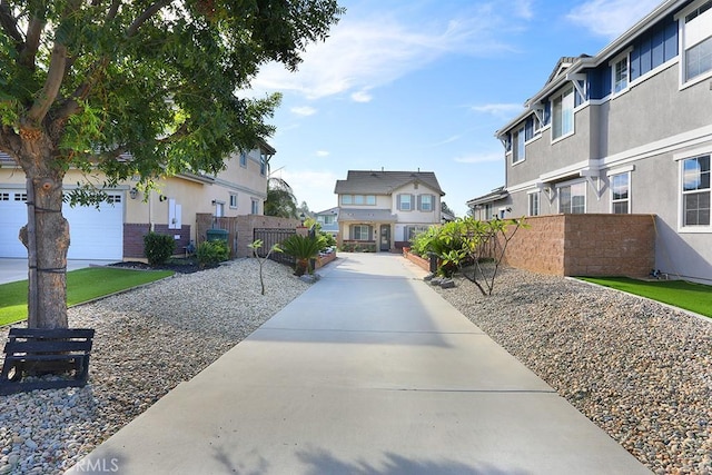 view of home's community with a garage