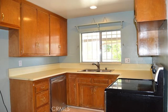 kitchen with sink and appliances with stainless steel finishes