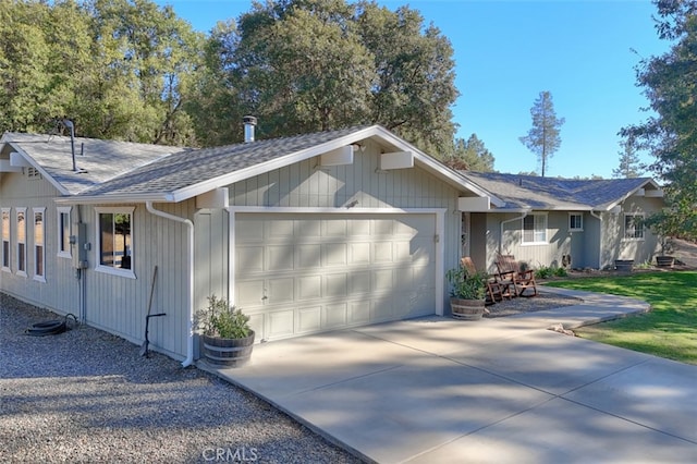 ranch-style home featuring a garage