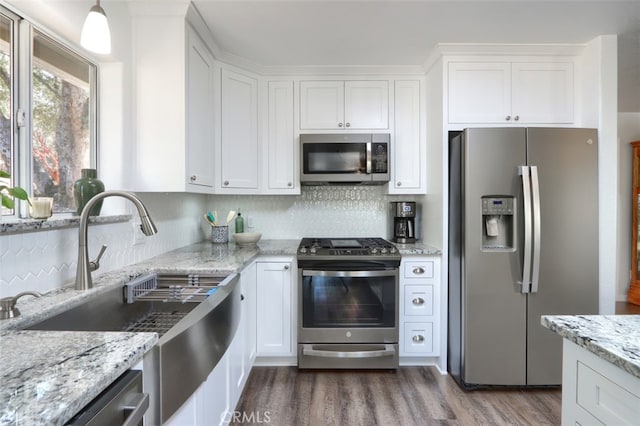 kitchen featuring white cabinets and stainless steel appliances