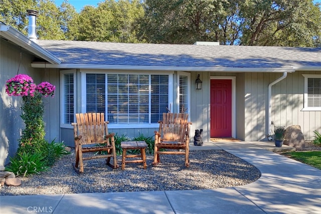 entrance to property featuring a patio