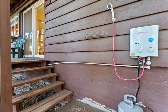 309 Castle Gate Rd, Lake Arrowhead, CA 92352 - exterior view of tankless water heater
