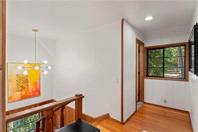 309 Castle Gate Rd, Lake Arrowhead, CA 92352 - hall featuring light wood-style flooring, an upstairs landing, a chandelier, and recessed lighting