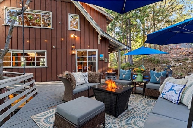 309 Castle Gate Rd, Lake Arrowhead, CA 92352 - wooden terrace featuring an outdoor living space with a fire pit