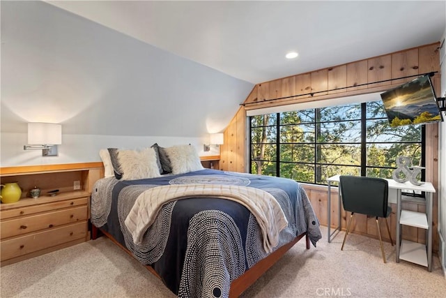 carpeted bedroom featuring lofted ceiling