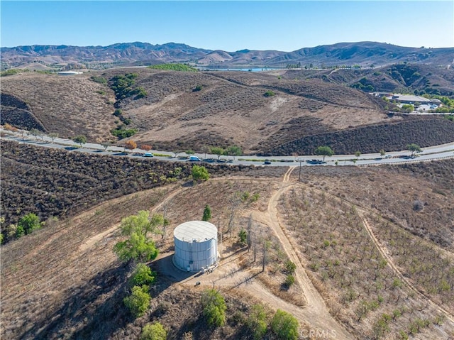 drone / aerial view featuring a mountain view