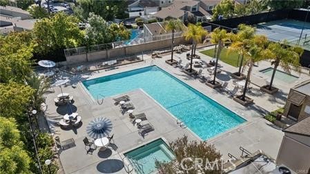 view of swimming pool with a patio