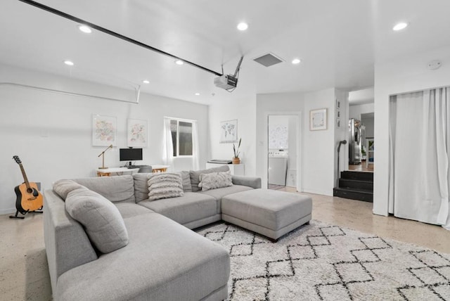 living room with washer / dryer