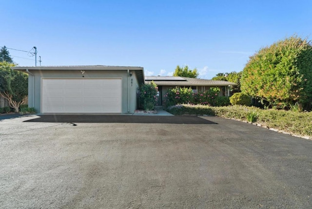 garage featuring solar panels