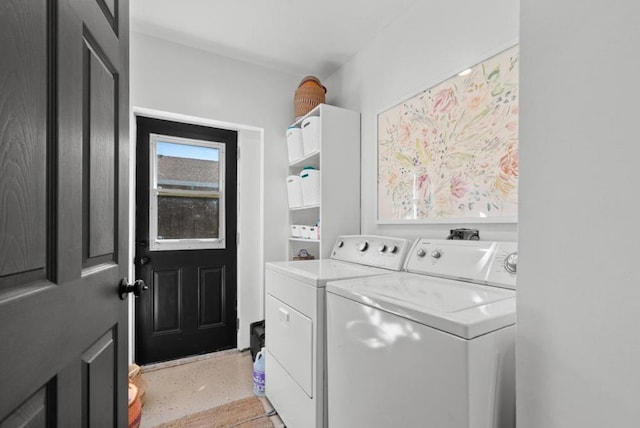 laundry room with separate washer and dryer