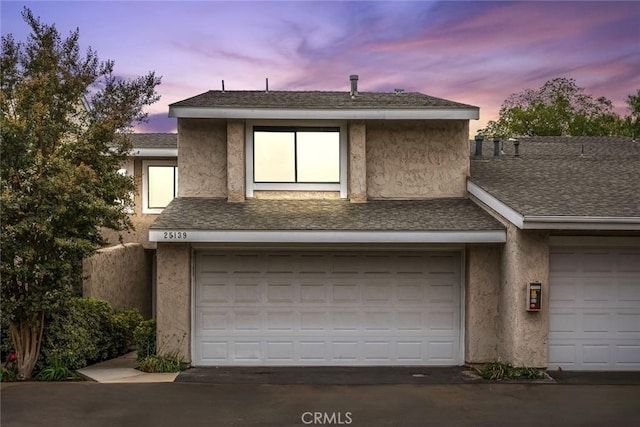 view of front of home with a garage