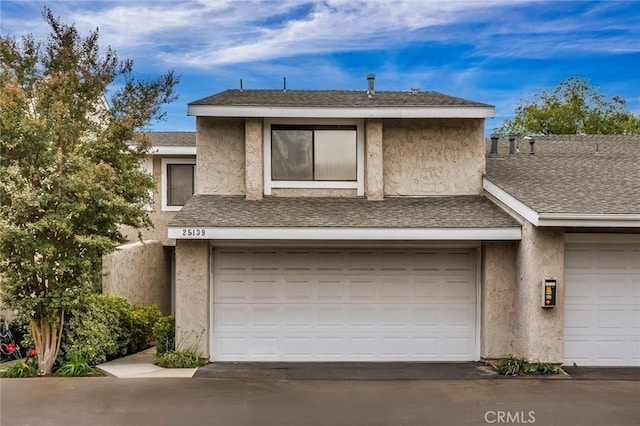 view of property featuring a garage