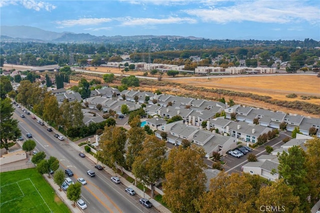 drone / aerial view featuring a mountain view