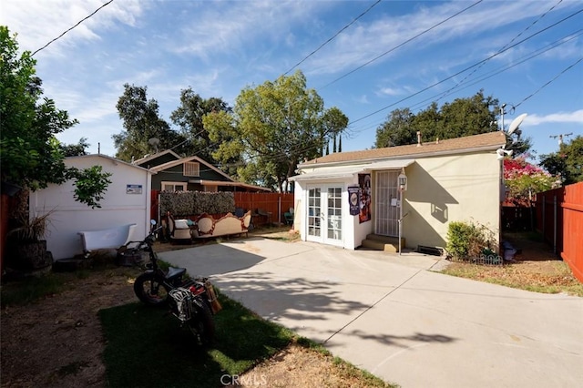 exterior space with a patio area and french doors