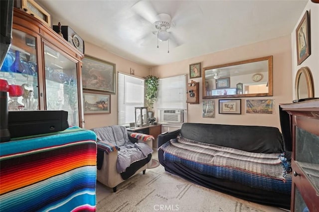 carpeted bedroom featuring ceiling fan and cooling unit