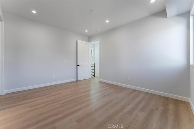 empty room with light wood-type flooring