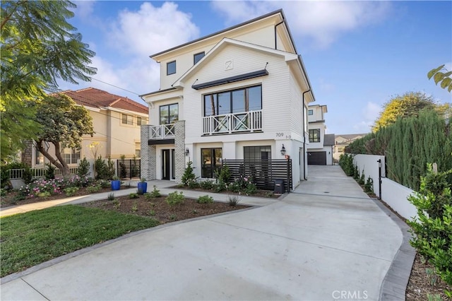 view of front of property with a balcony