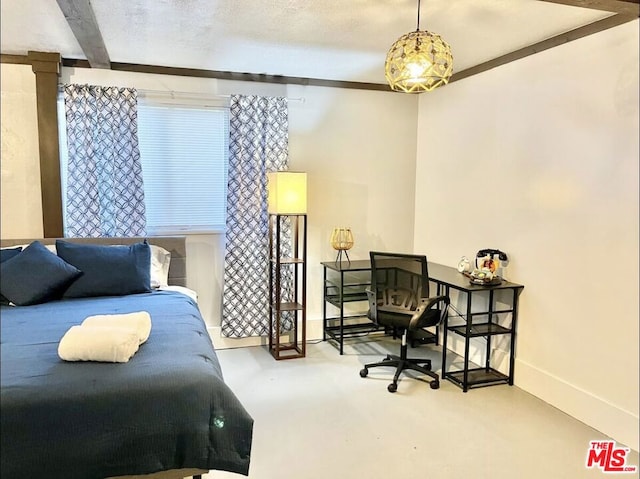 bedroom featuring beam ceiling