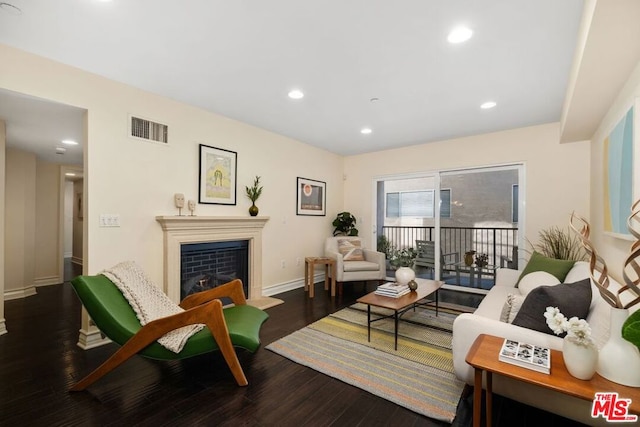 living room with dark wood-type flooring