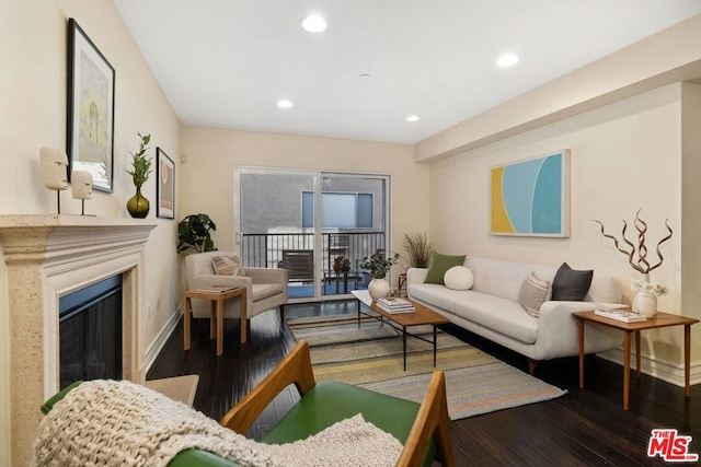 living room featuring dark wood-type flooring