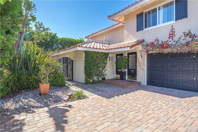 property entrance with a garage