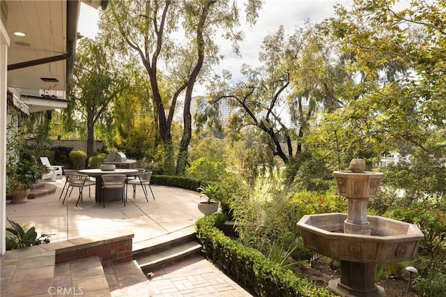 3 Cypress Point Ln, Newport Beach, CA 92660 - view of patio / terrace featuring outdoor dining area and view of wooded area